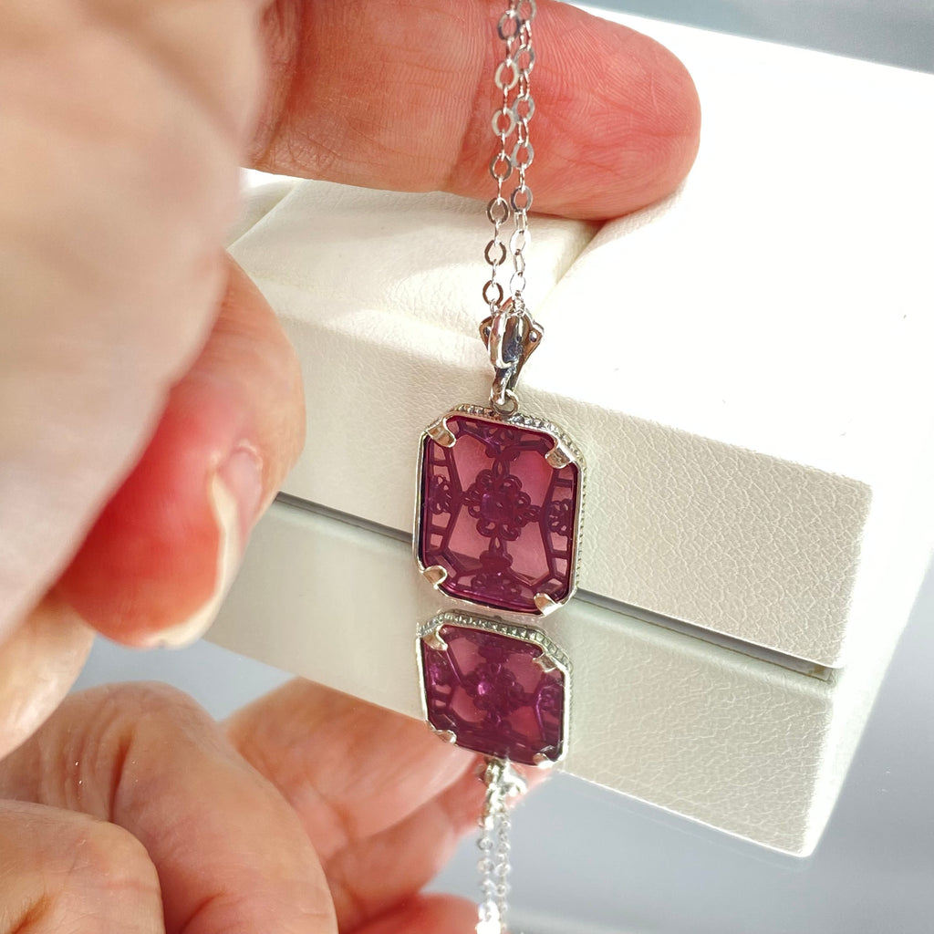 Pink Camphor Glass pendant with a CZ gem inset in the center, sterling silver filigree edging and across the glass face in window pane style, Silver Embrace Jewelry, P203
