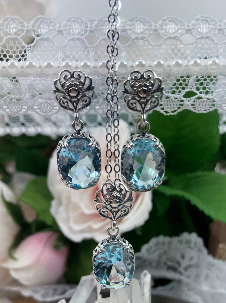 aquamarine jewelry, sky blue oval stones and antique floral sterling silver filigree, includes earrings with floral posts, pendant with chain and floral bail, Edward Design#70z