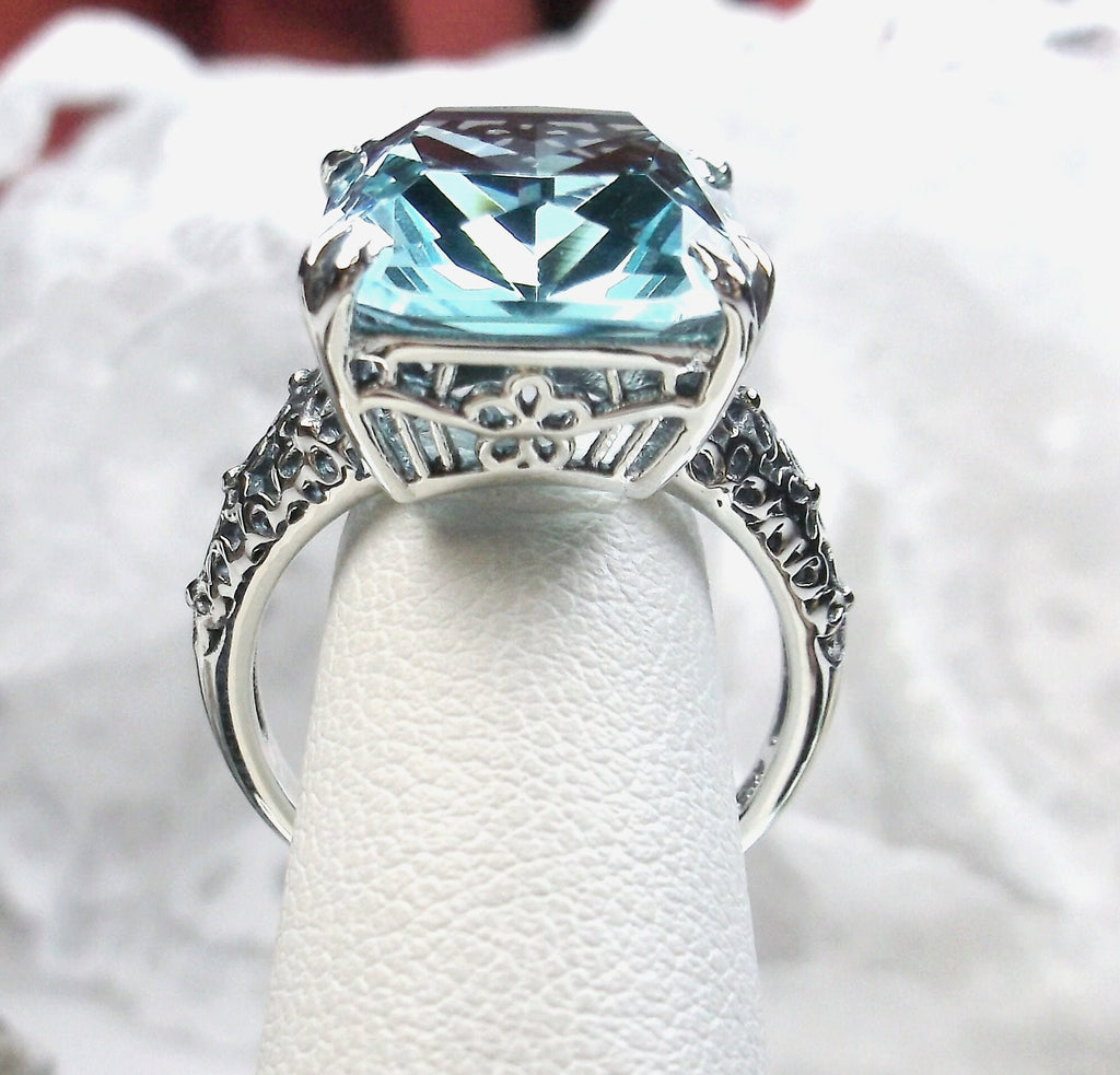 a fancy ring with a blue topaz surrounded by filigree, Aquamarine ring, Sky Blue Gemstone, cushion Cut, rectangle gemstone, Floral Vintage Sterling silver Filigree, Silver Embrace Jewelry, D224