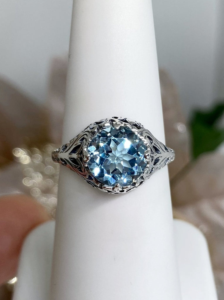 natural sky blue topaz solitaire ring with swirl antique floral sterling silver filigree