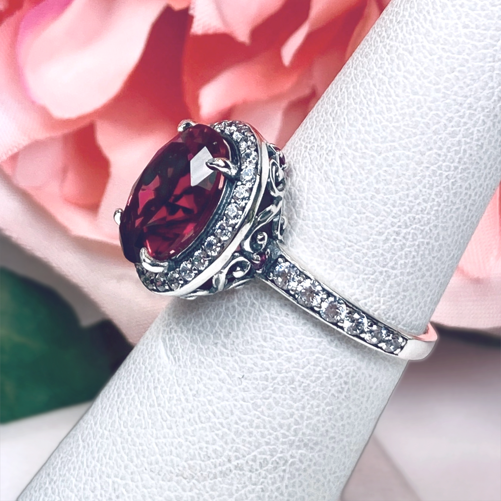 Ring with Red Ruby center gem surrounded by white CZ tiny gems, with white CZ gems down the shank, Ruby Halo Ring, White CZ Accent gems, Art Deco Sterling Silver Filigree, Halo Ring D228 | Silver Embrace Jewelry