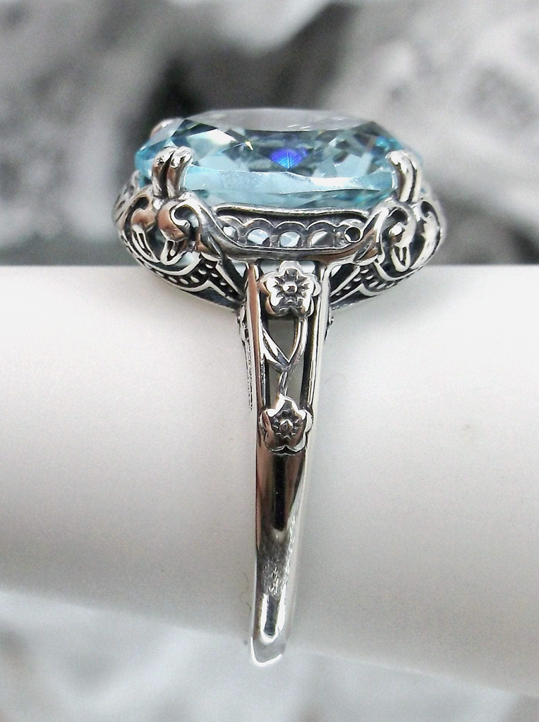Aquamarine Ring, Sky Blue simulated oval gemstone, Sterling Silver floral filigree, Edward design #D70z, side view