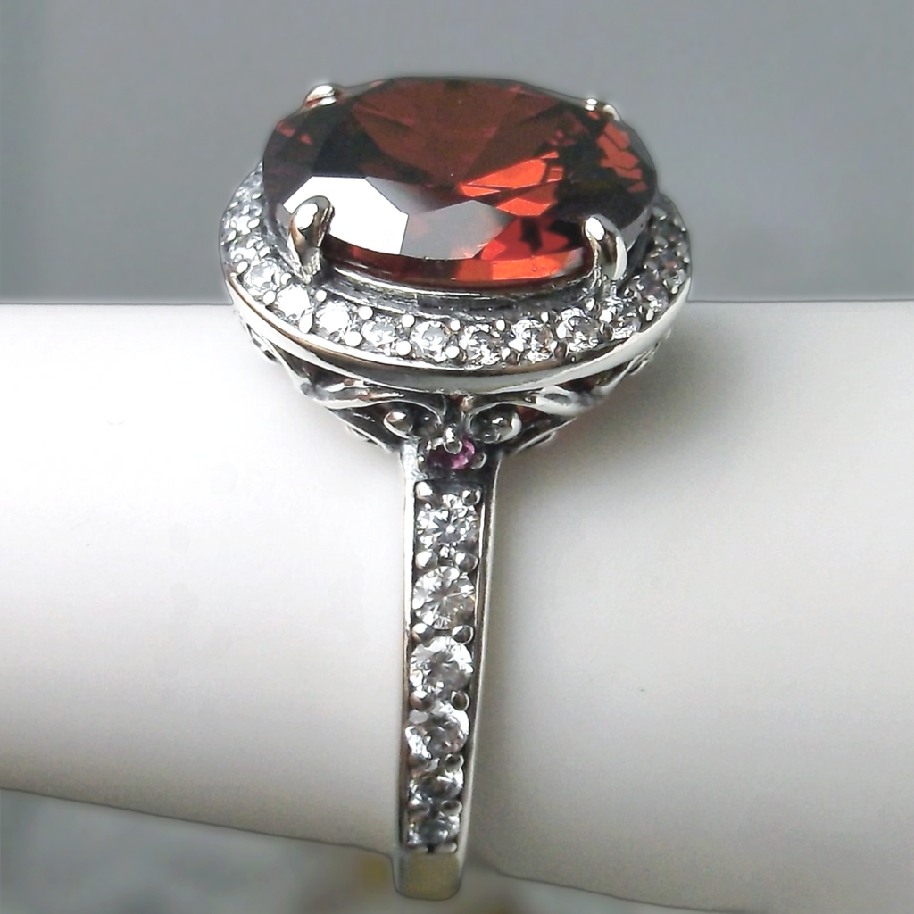 a close up of a ring with a stone on it