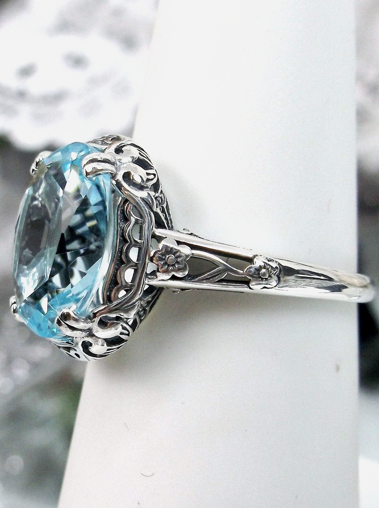 Aquamarine Ring, Sky Blue simulated oval gemstone, Sterling Silver floral filigree, Edward design #D70z,  side view