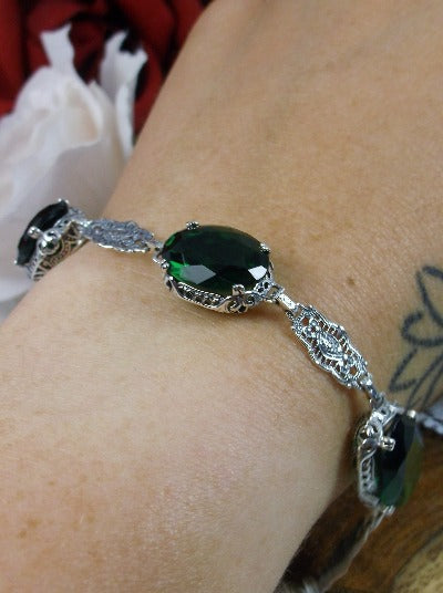 Edwardian style bracelet with Emerald Green oval stones, silver filigree links and lobster claw clasp, Silver Embrace Jewelry