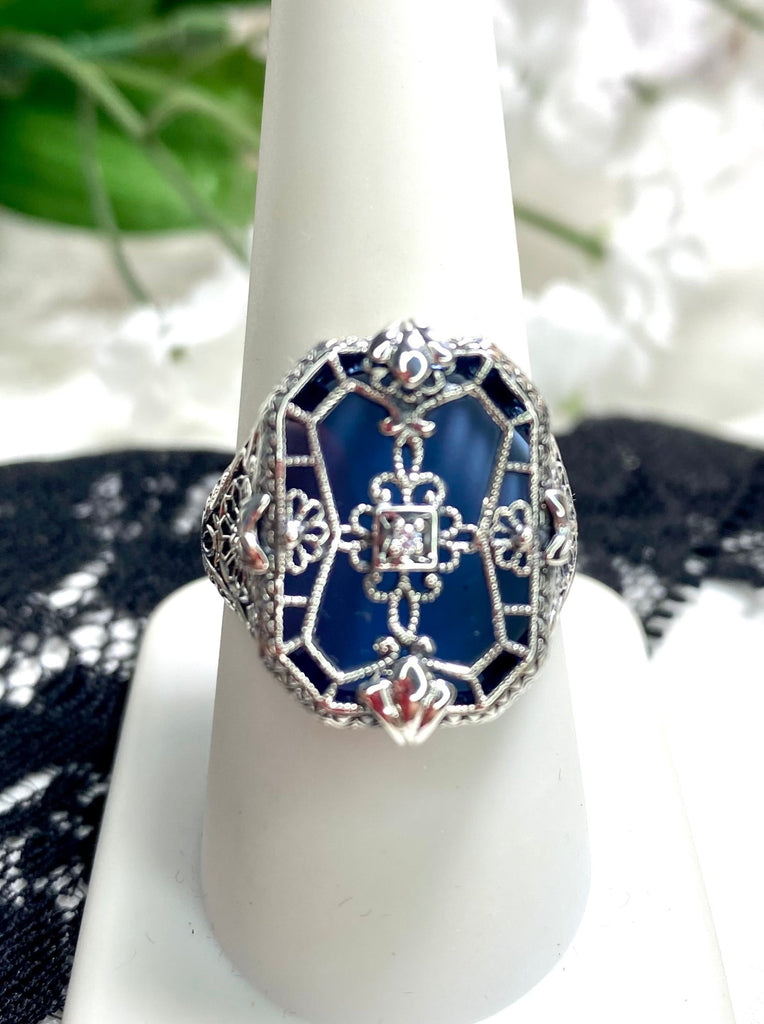 Sapphire Blue Glass Ring with Sterling Silver Art Deco Filigree and a single white CZ in the center of the pane sections