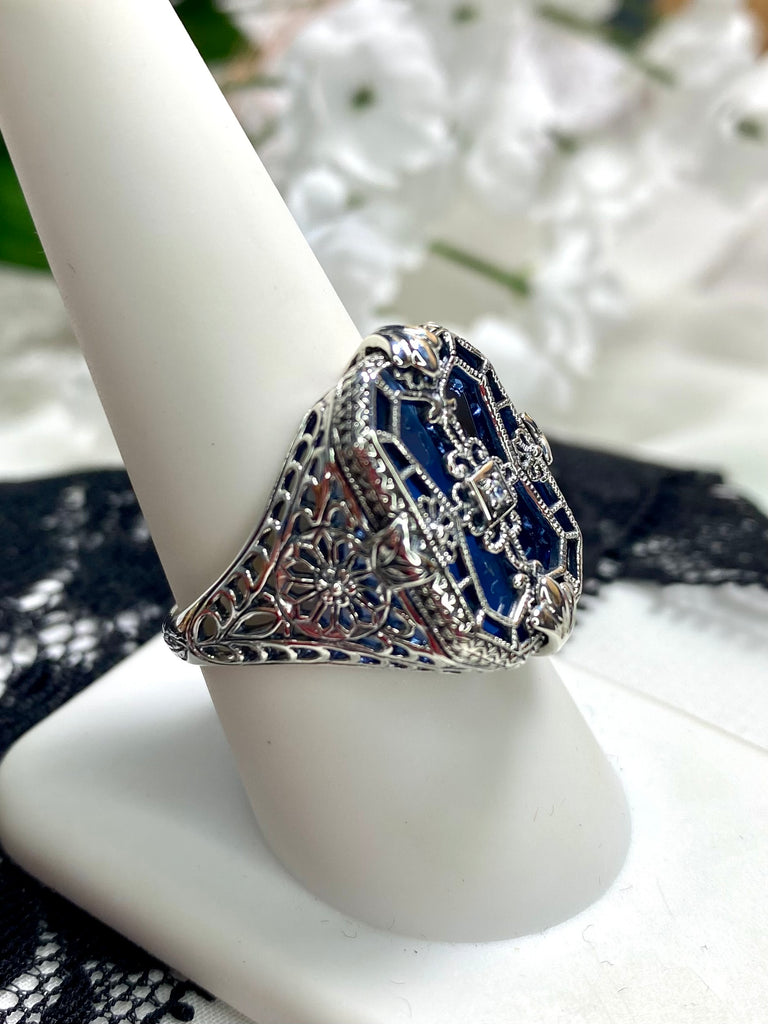 Sapphire Blue Glass Ring with Sterling Silver Art Deco Filigree and a single white CZ in the center of the pane sections