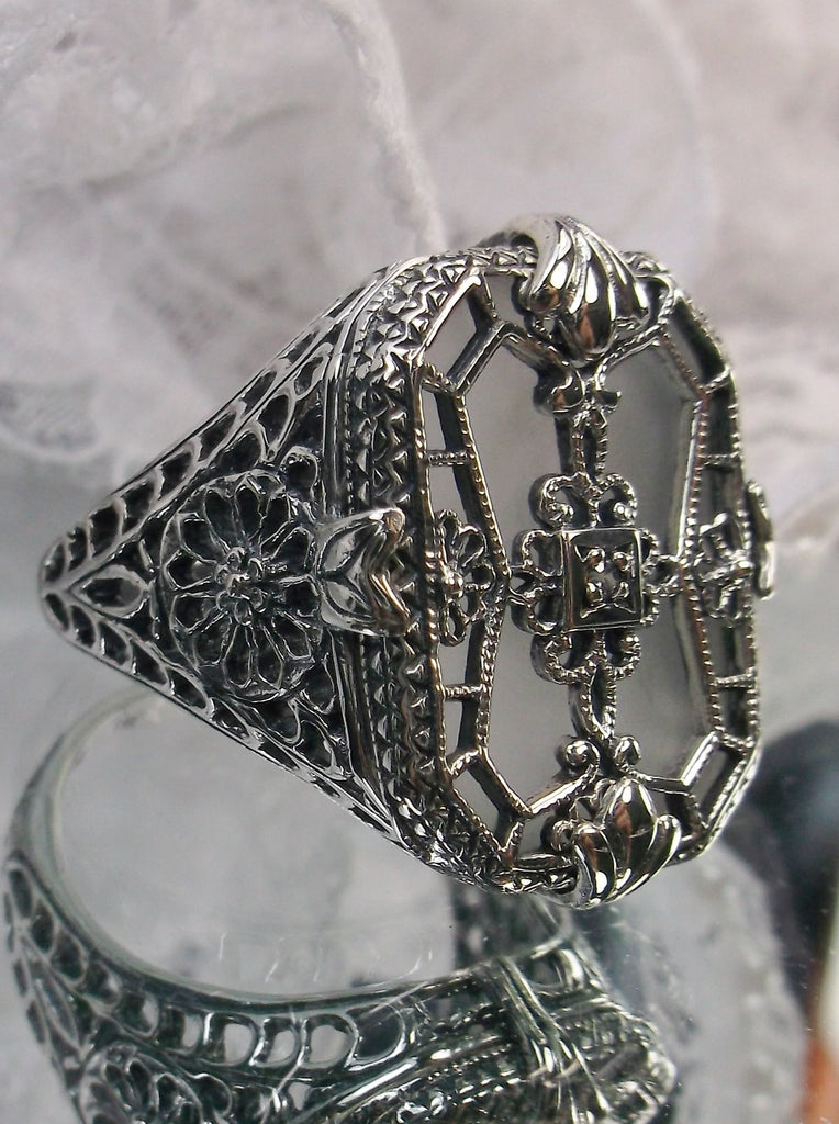 Frosted White Camphor Glass Ring with Sterling Silver Art Deco Filigree and a single white CZ in the center of the pane sections