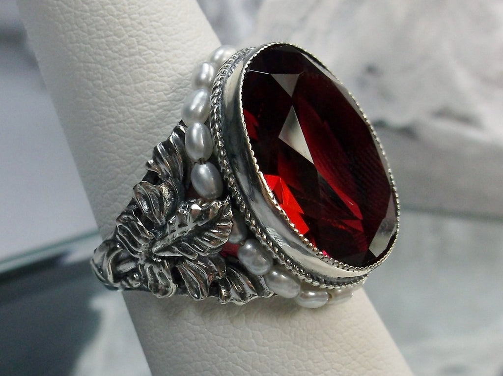 Red Garnet Art Nouveau style sterling silver ring, oval red gem with seed pearls encircling the gem edge and palm tree silver filigree accents on each side of the band
