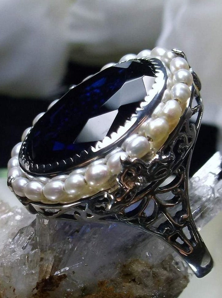 Ring with Sapphire & 0.25 Carat TW of Diamonds in 10kt Yellow & White Gold