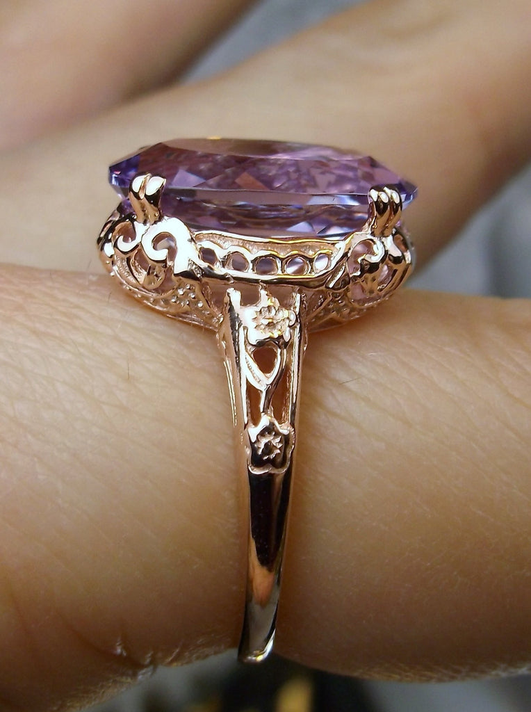 Side view of a Natural Purple Amethyst Rose Gold plated Sterling Silver Filigree Ring, Edward Design#70 on a finger