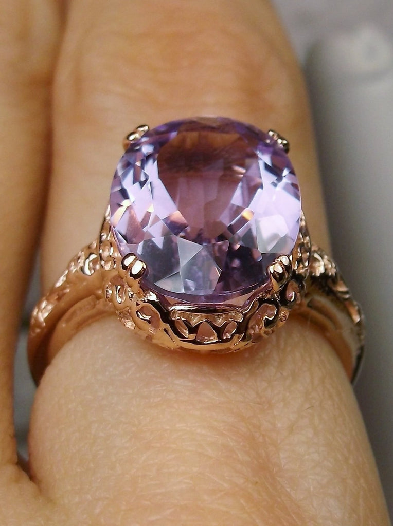 Front offset view of a Natural Purple Amethyst Rose Gold plated Sterling Silver Filigree Ring, Edward Design#70 on a finger