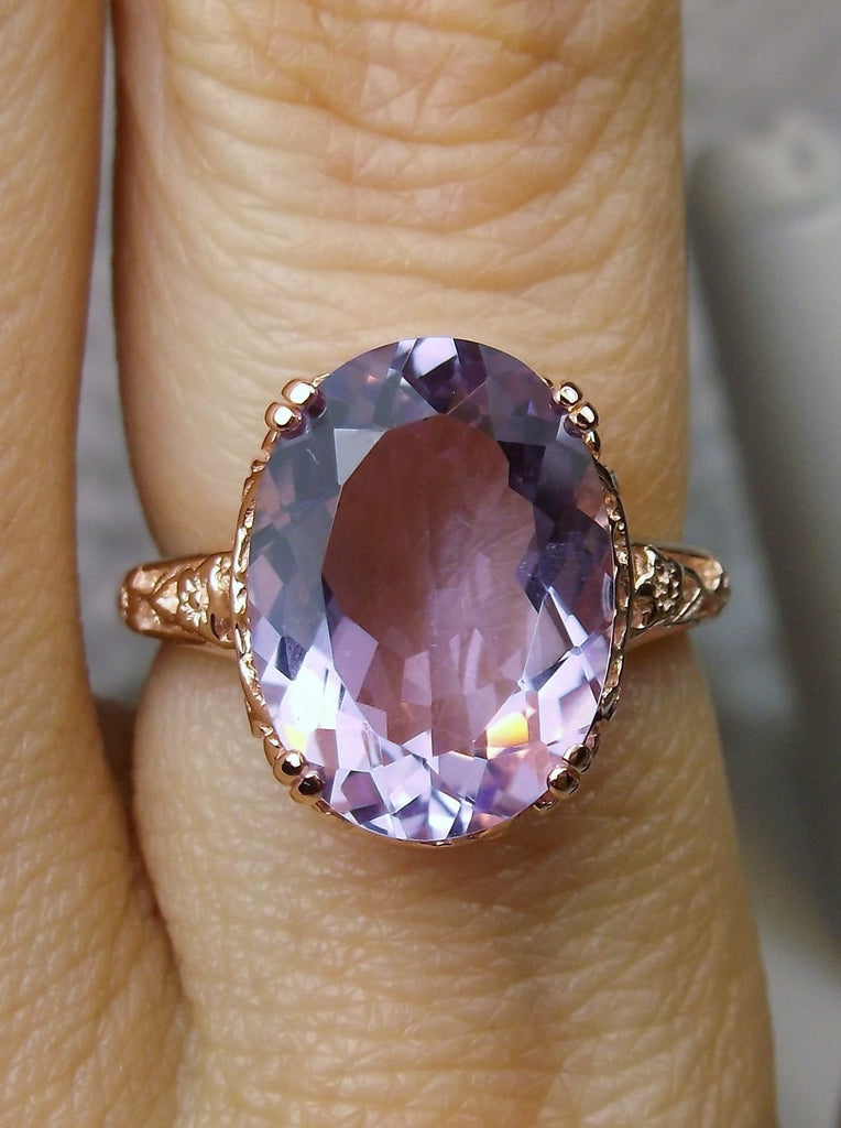 Top view of a Natural Purple Amethyst Rose Gold plated Sterling Silver Filigree Ring, Edward Design#70 on a finger