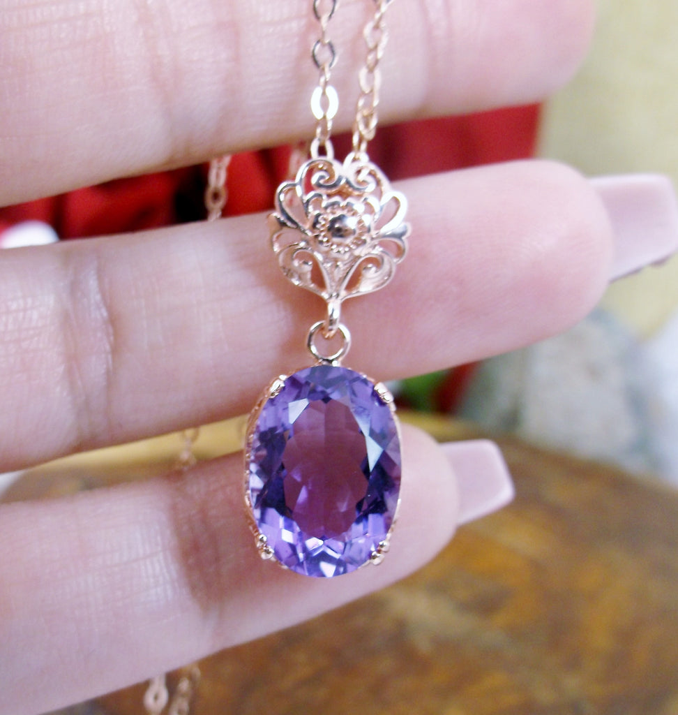 purple Amethyst pendant necklace, with a natural purple Amethyst oval stone set in floral rose gold filigree, 4 prongs hold the gem in place, Silver Embrace Jewelry