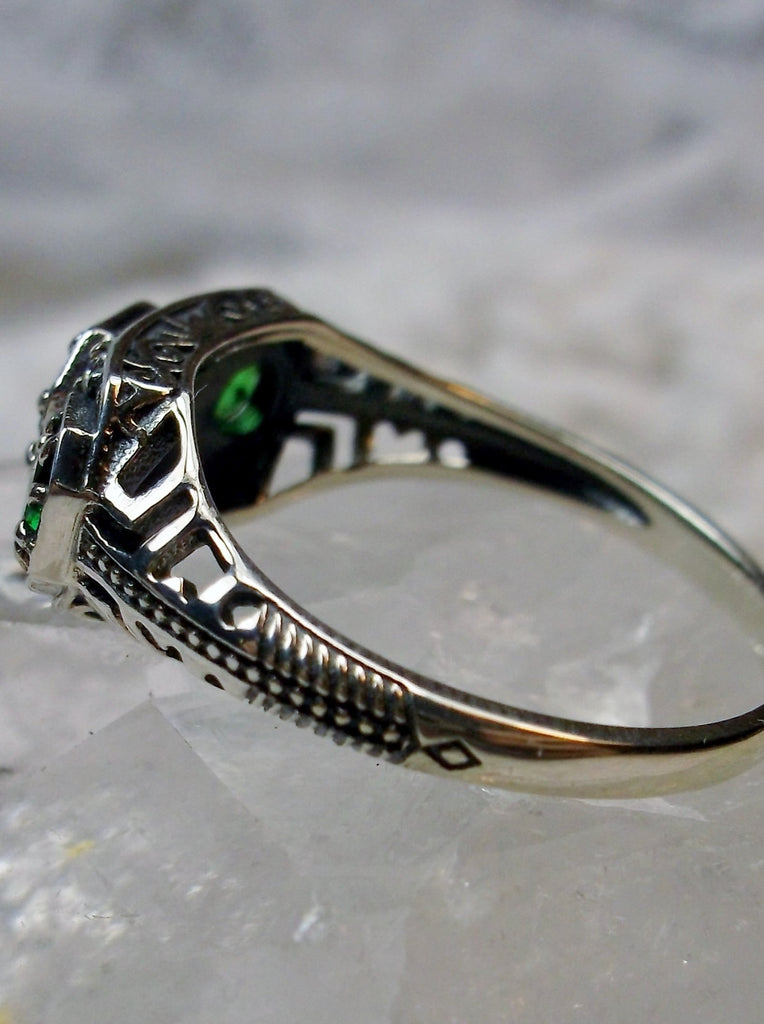 Art deco style ring with three green emeralds set in sterling silver filigree