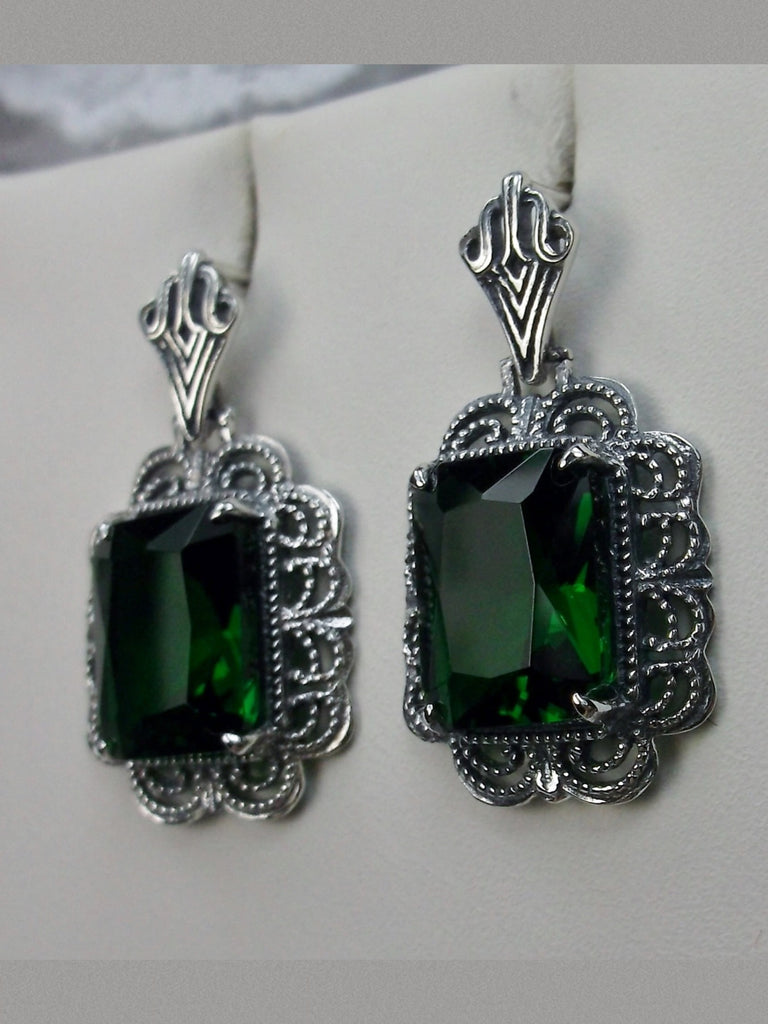 Rectangle Emerald Green Art Deco style earrings with fine lace filigree edging surrounding a lovely rectangle gemstone, and with fine Art Deco style ear post closures