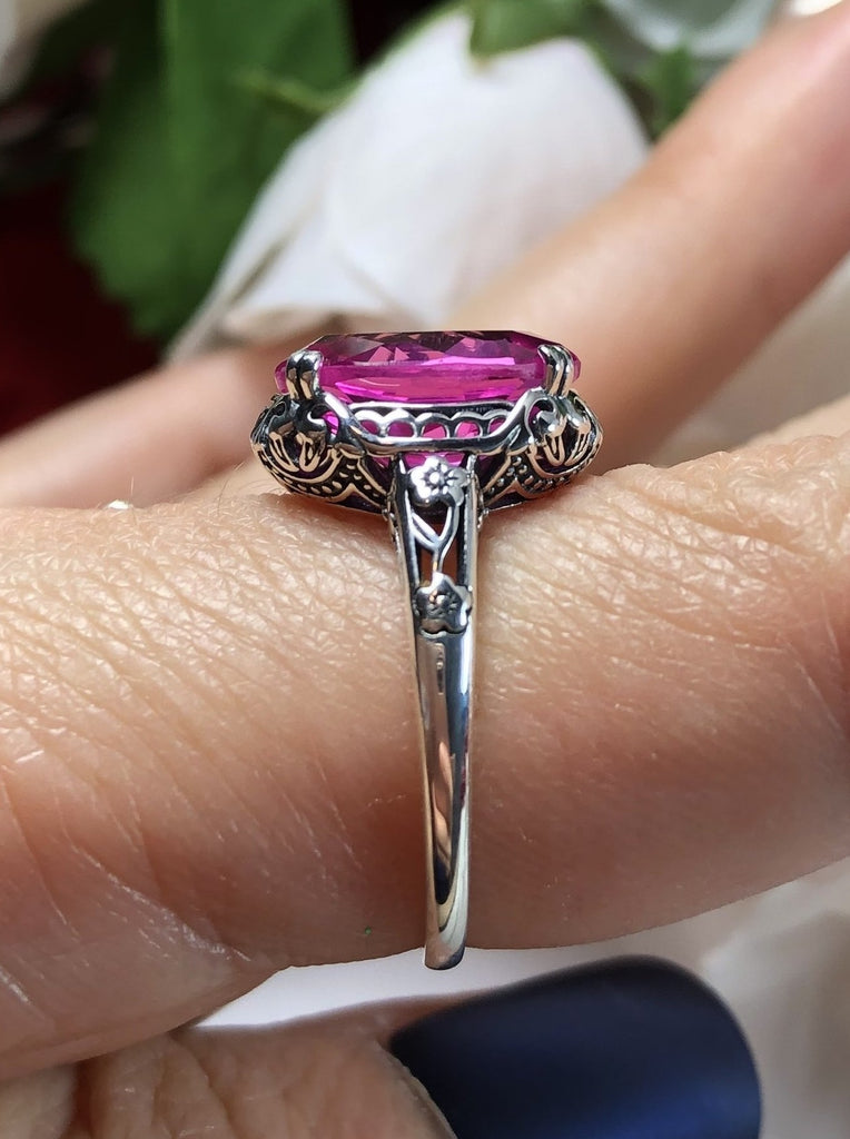 Natural Pink topaz Ring, 3.4 carat oval faceted gemstone, sterling silver floral filigree, Edward design #D70z, side view on finger