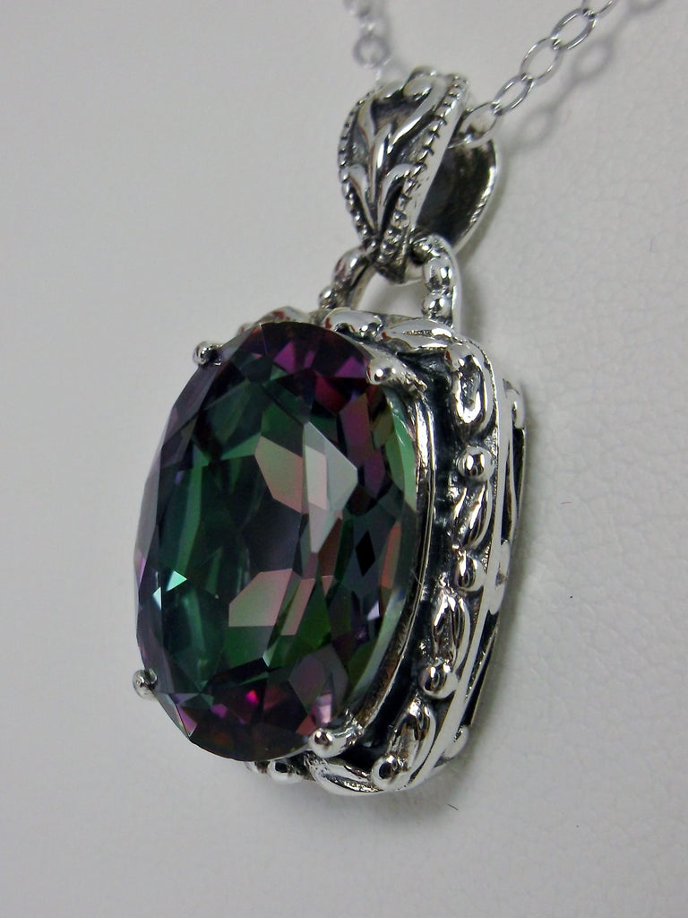 Mystic Topaz Pendant, oval mystic topaz gemstone surrounded by sterling silver leaf accent detail, creating a charming Art Nouveau pendant