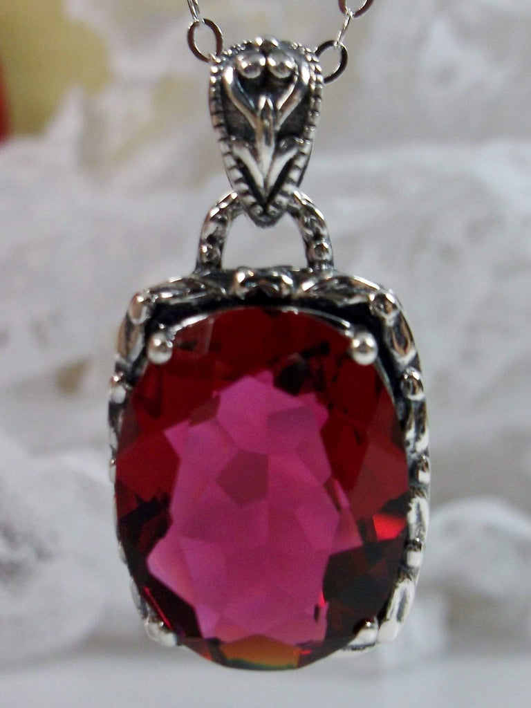 Red Ruby Pendant, Leaf Accent Pendant, oval faceted gemstone surrounded by sterling silver leaf accent detail, creating a charming Art Nouveau pendant, Sterling silver Filigree, Silver Embrace Jewelry P120