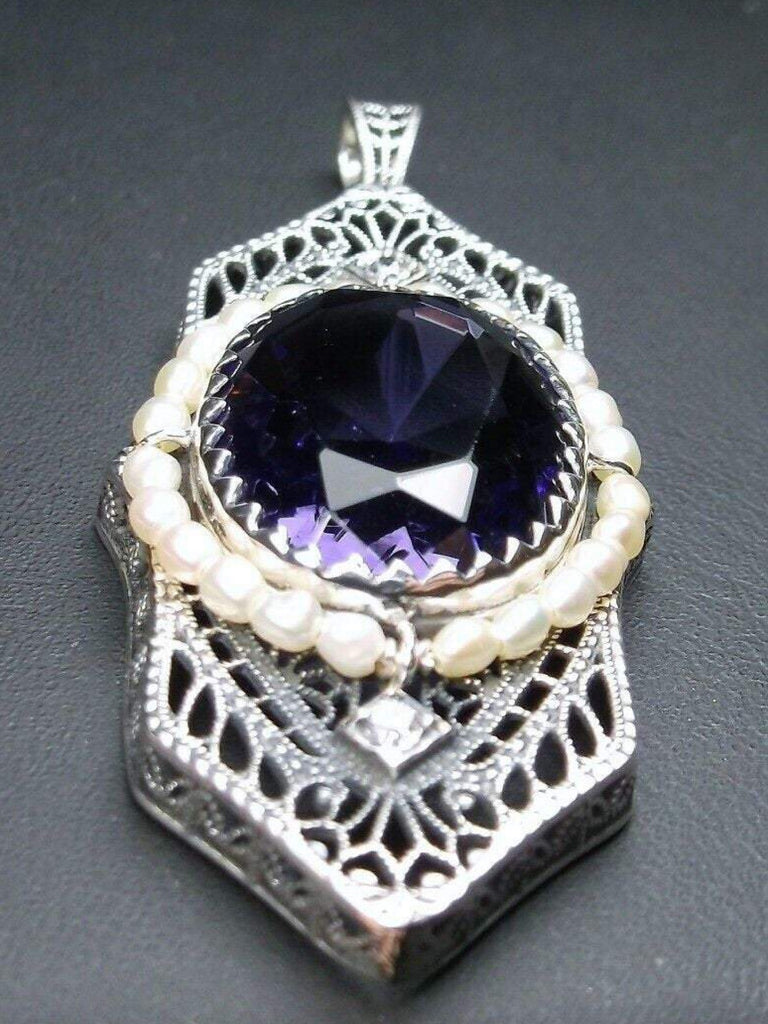 Purple Amethyst Pendant, Art Deco 1930s jewelry, seed pearl accents surround an oval gemstone with a sterling silver filigree background. two White CZs adorn above and below the large brilliant focal gemstone, Silver Embrace Jewelry necklace