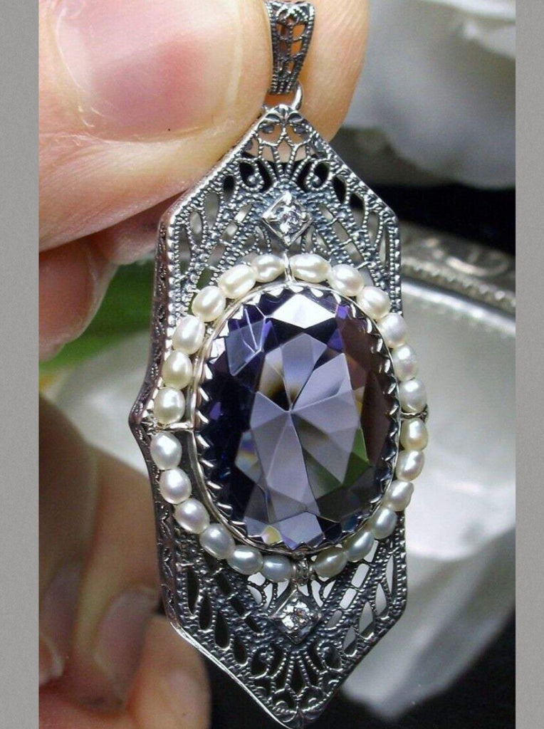 Purple Amethyst Pendant, Art Deco 1930s jewelry, seed pearl accents surround an oval gemstone with a sterling silver filigree background. two White CZs adorn above and below the large brilliant focal gemstone, Silver Embrace Jewelry necklace