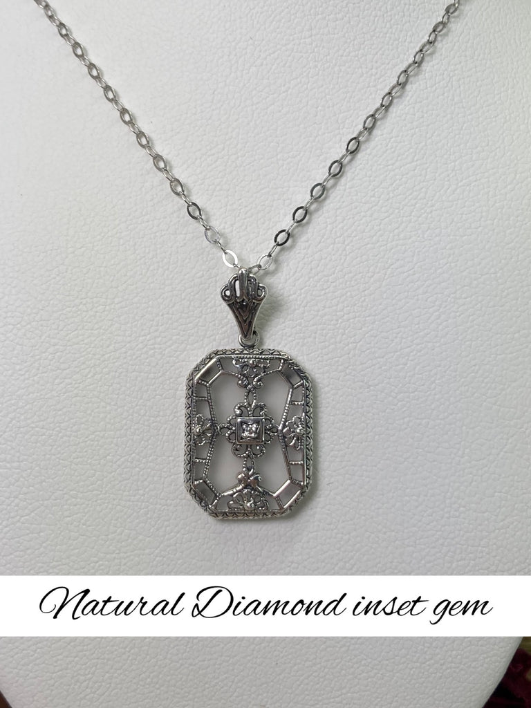 White Frosted Camphor Glass pendant with a Diamond gem inset in the center, sterling silver filigree edging and across the glass face in window pane style