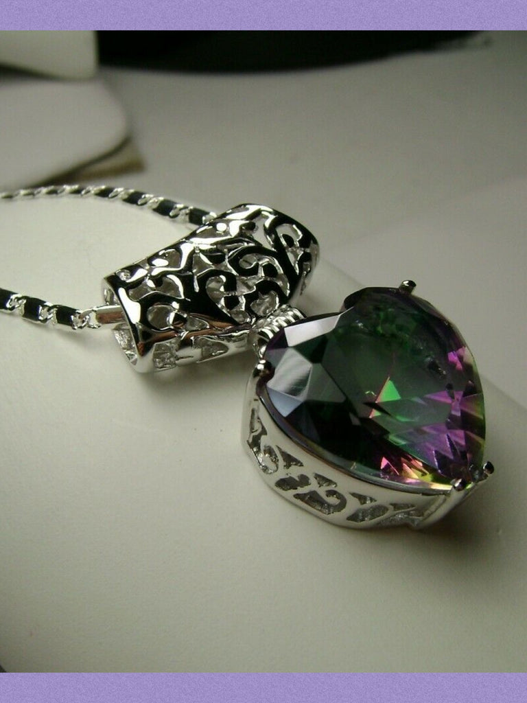 Heart shaped mystic topaz pendant with sterling silver filigree detail, Silver Embrace Jewelry