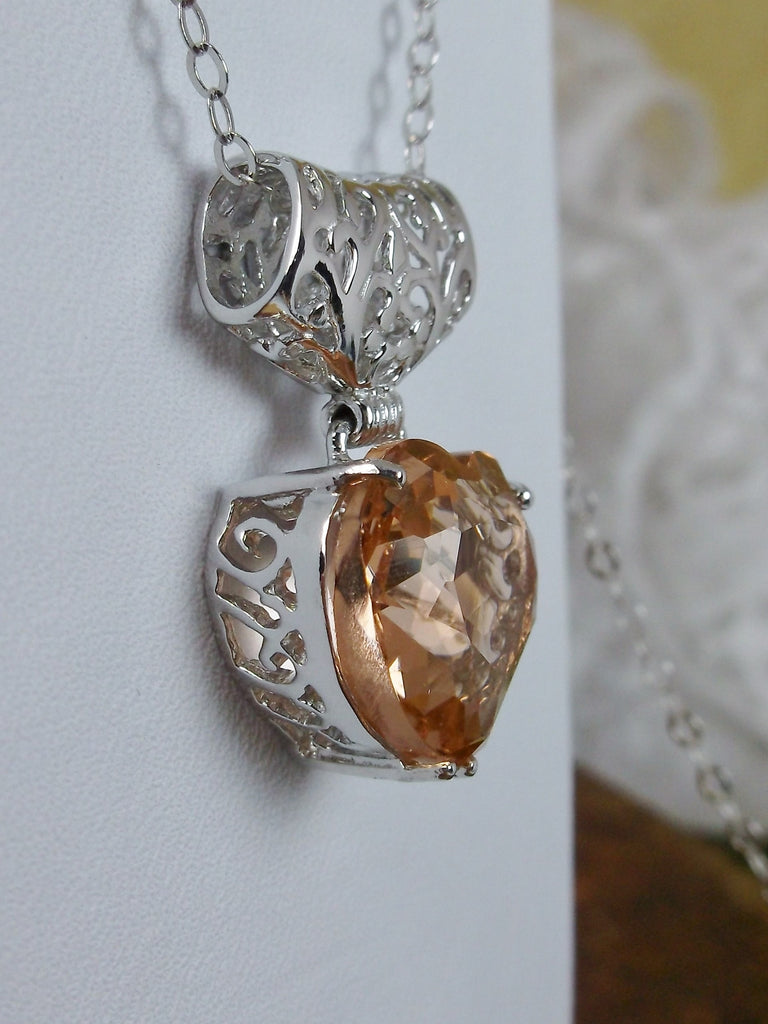 Heart shaped Peach topaz pendant with sterling silver filigree detail, Silver Embrace Jewelry
