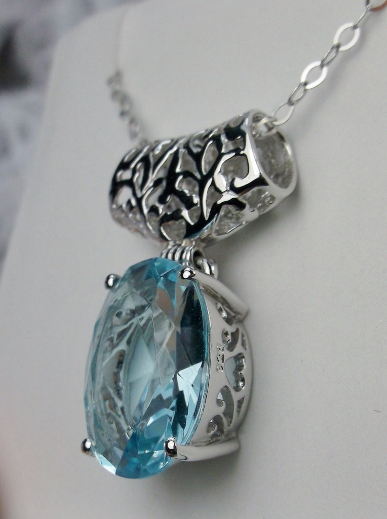 Sky Blue Aquamarine pendant with art deco sterling silver filigree a wide bail holds the swiveling oval stone, Silver Embrace Jewelry