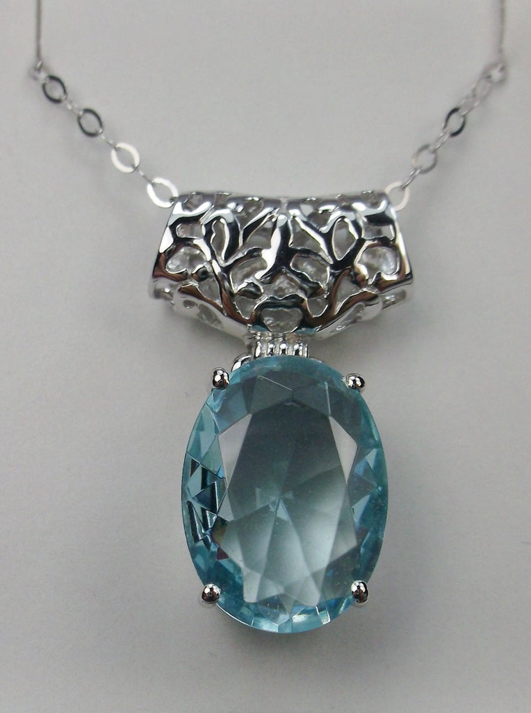 Sky Blue Aquamarine pendant with art deco sterling silver filigree a wide bail holds the swiveling oval stone, Silver Embrace Jewelry
