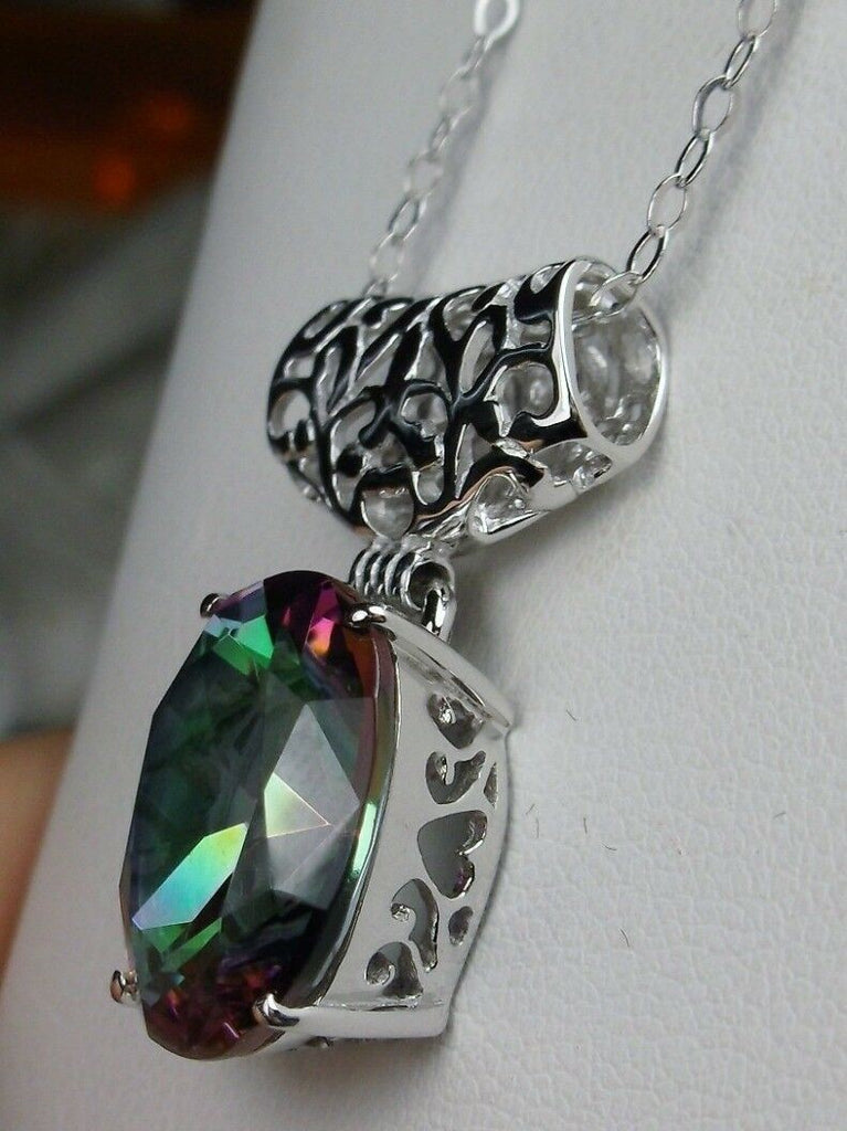 mystic rainbow topaz stone pendant with art deco sterling silver filigree a wide bail holds the swiveling oval stone, Silver Embrace Jewelry