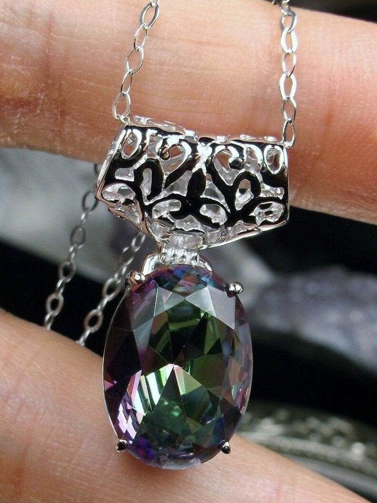 mystic rainbow topaz stone pendant with art deco sterling silver filigree a wide bail holds the swiveling oval stone, Silver Embrace Jewelry