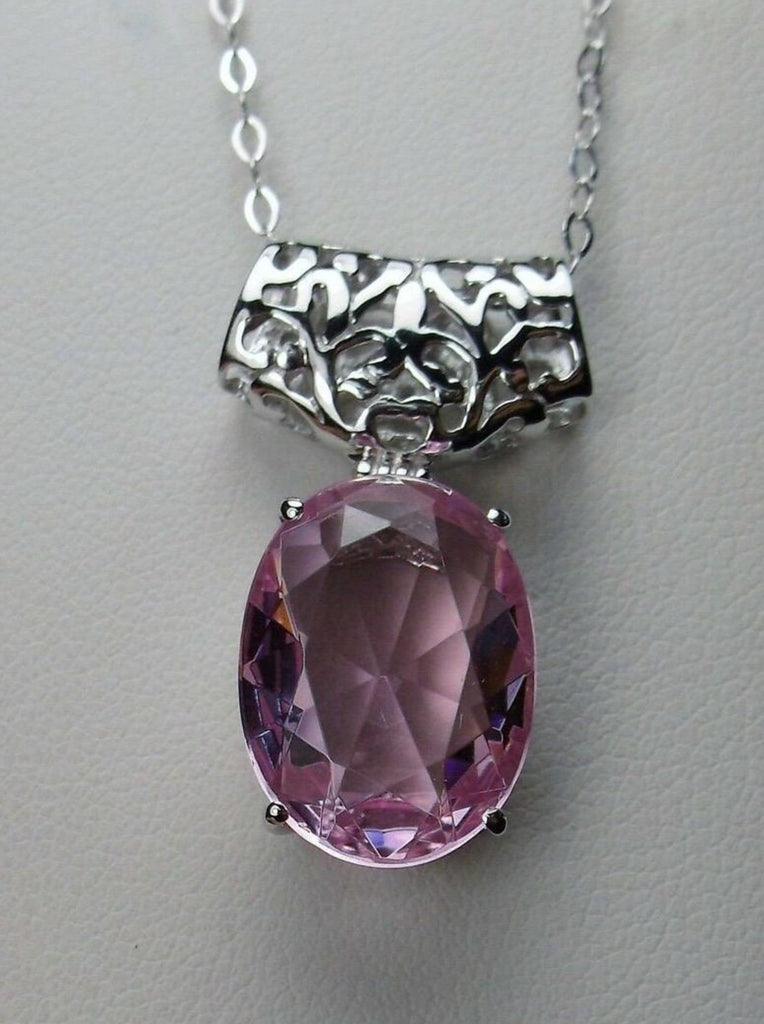 Pink Topaz pendant with art deco sterling silver filigree a wide bail holds the swiveling oval stone, Silver Embrace Jewelry