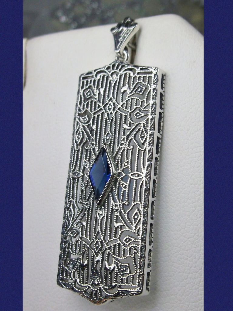 Blue Sapphire Pendant, Rectangle Art Deco style pendant with fine lace filigree and a diamond shaped sapphire blue gemstone in the center of the filigree, Silver Embrace jewelry