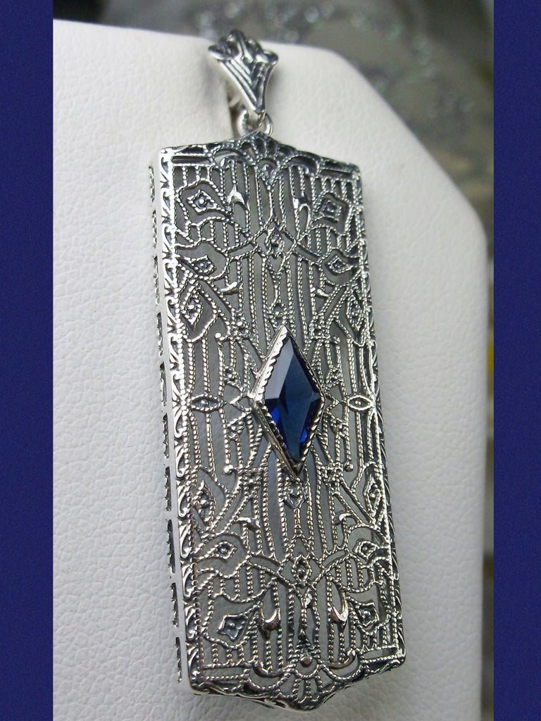 Blue Sapphire Pendant, Rectangle Art Deco style pendant with fine lace filigree and a diamond shaped sapphire blue gemstone in the center of the filigree, Silver Embrace jewelry