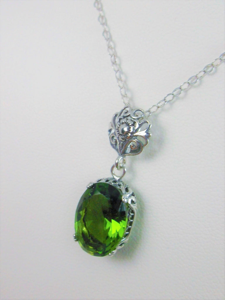 Green Peridot Pendant Necklace, green peridot pendant, with a chartruese oval stone set in floral sterling silver filigree, 4 prongs hold the gem in place, Silver Embrace Jewelry