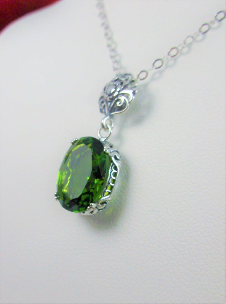 Green Peridot Pendant Necklace, green peridot pendant, with a chartruese oval stone set in floral sterling silver filigree, 4 prongs hold the gem in place, Silver Embrace Jewelry
