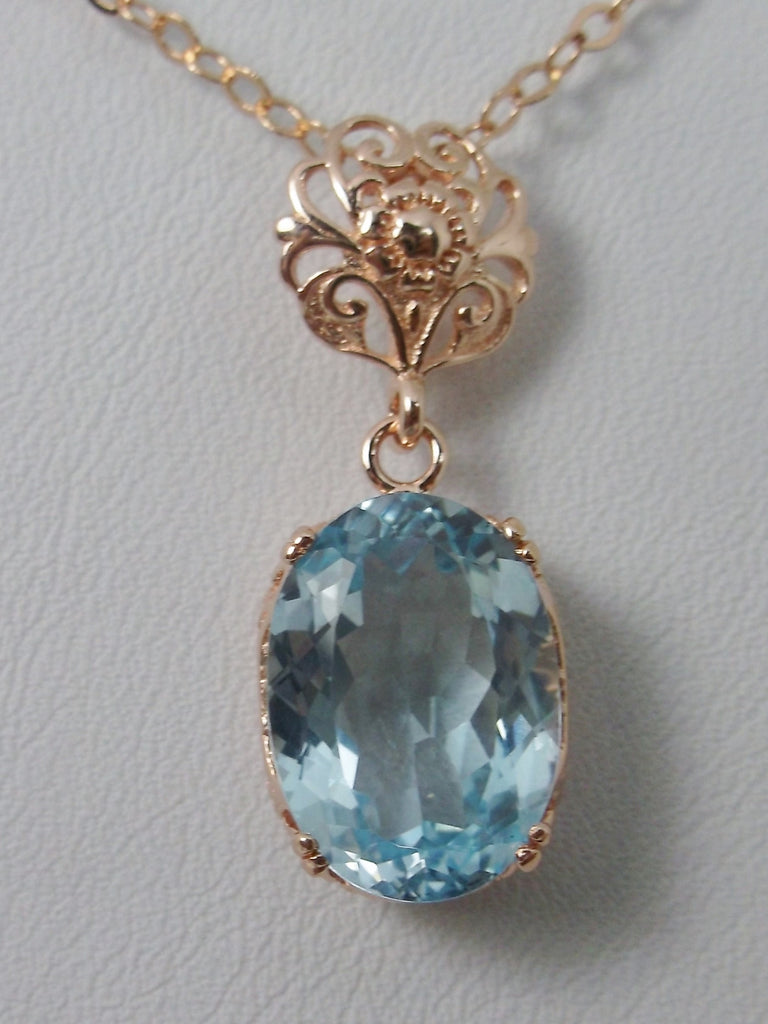 Natural Topaz Pendant Necklace, blue topaz pendant, with a natural blue topaz oval stone set in floral rose gold filigree, 4 prongs hold the gem in place, Silver Embrace Jewelry
