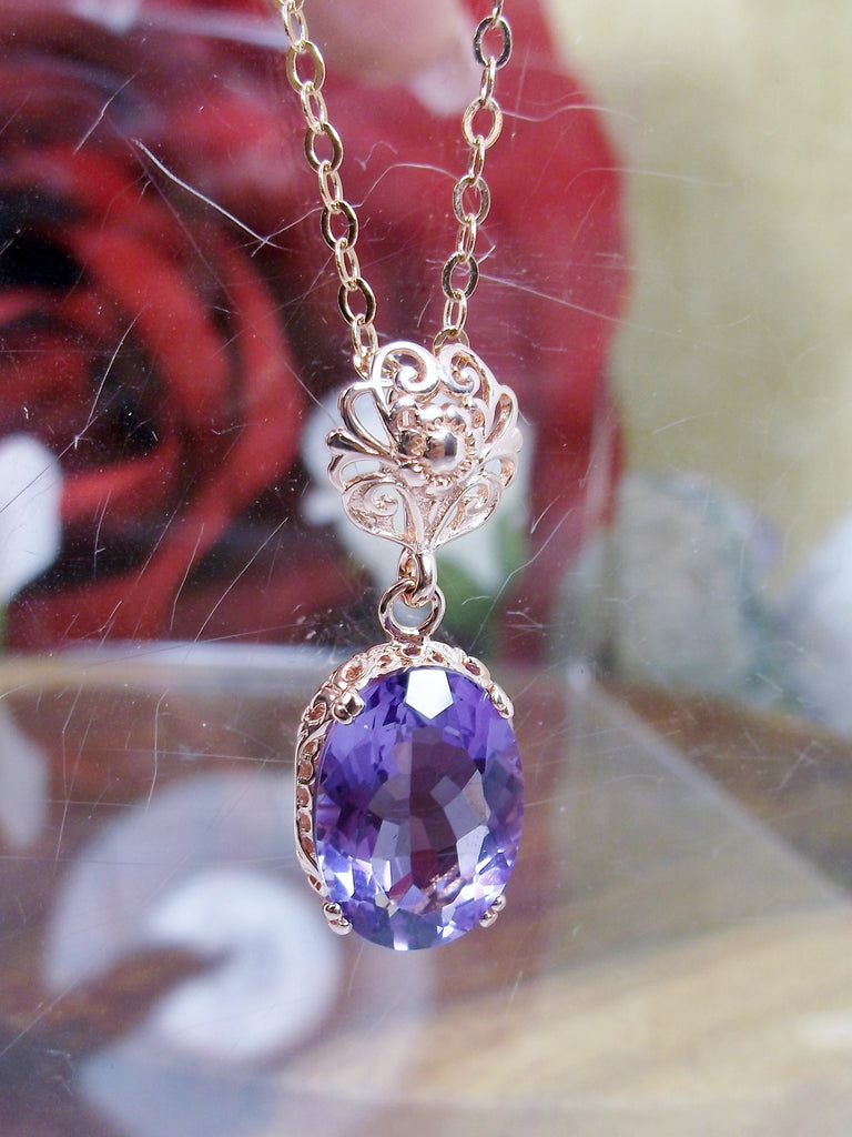 purple Amethyst pendant necklace, with a natural purple Amethyst oval stone set in floral rose gold filigree, 4 prongs hold the gem in place, Silver Embrace Jewelry