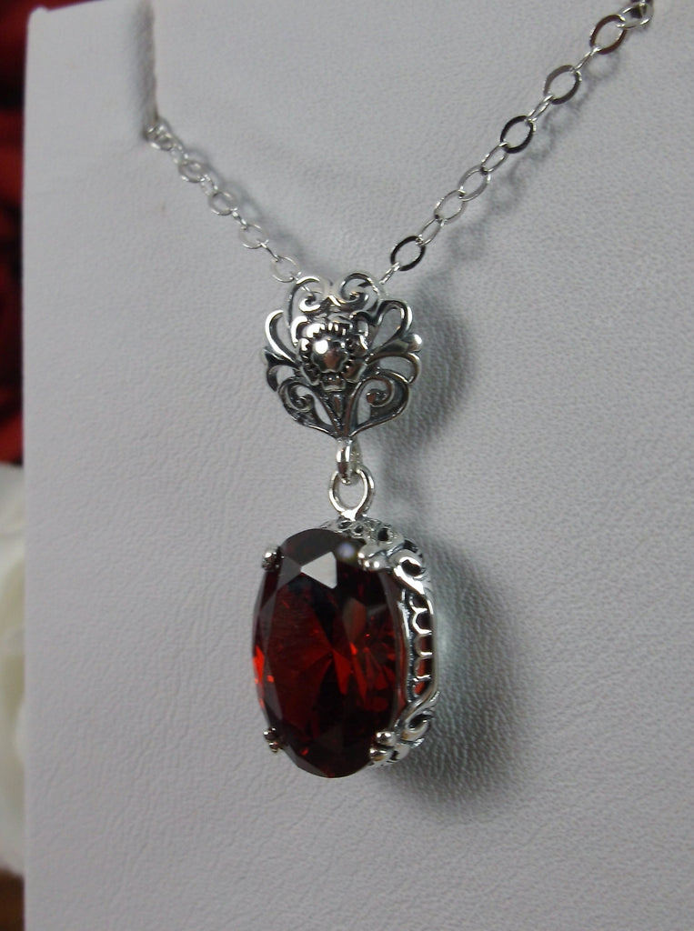 Red Garnet CZ Pendant Necklace, garnet pendant, with a deep red oval stone set in floral sterling silver filigree, 4 prongs hold the gem in place, Silver Embrace Jewelry