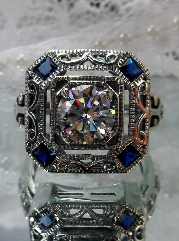 art deco style ring with a white CZ center stone and 4 deep blue gems in each corner of the octagonal filigree, D68, Silver Embrace Jewelry, Silver Filigree