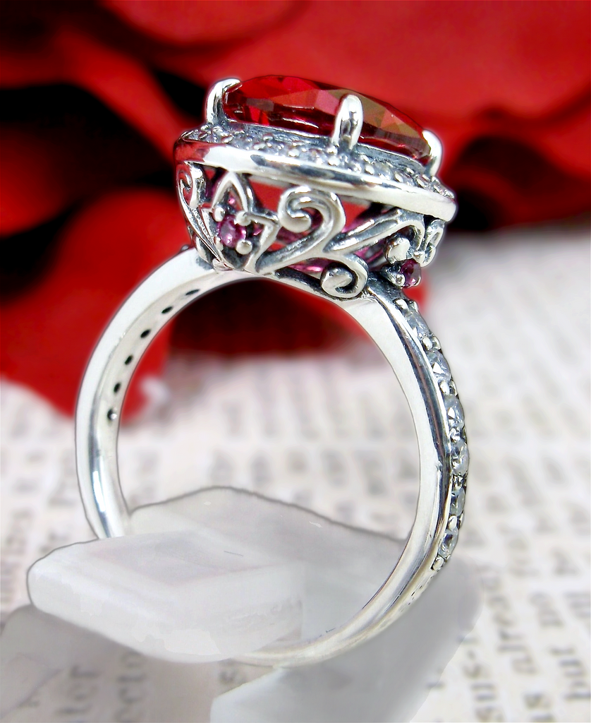 Ring with Red Ruby center gem surrounded by white CZ tiny gems, with white CZ gems down the shank, Ruby Halo Ring, White CZ Accent gems, Art Deco Sterling Silver Filigree, Halo Ring D228 | Silver Embrace Jewelry