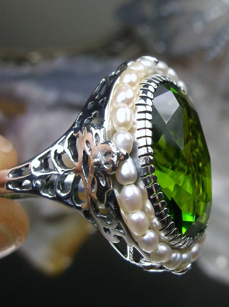 Peridot Ring, Seed Pearls surround and accent the simulated oval stone with sterling silver Victorian filigree