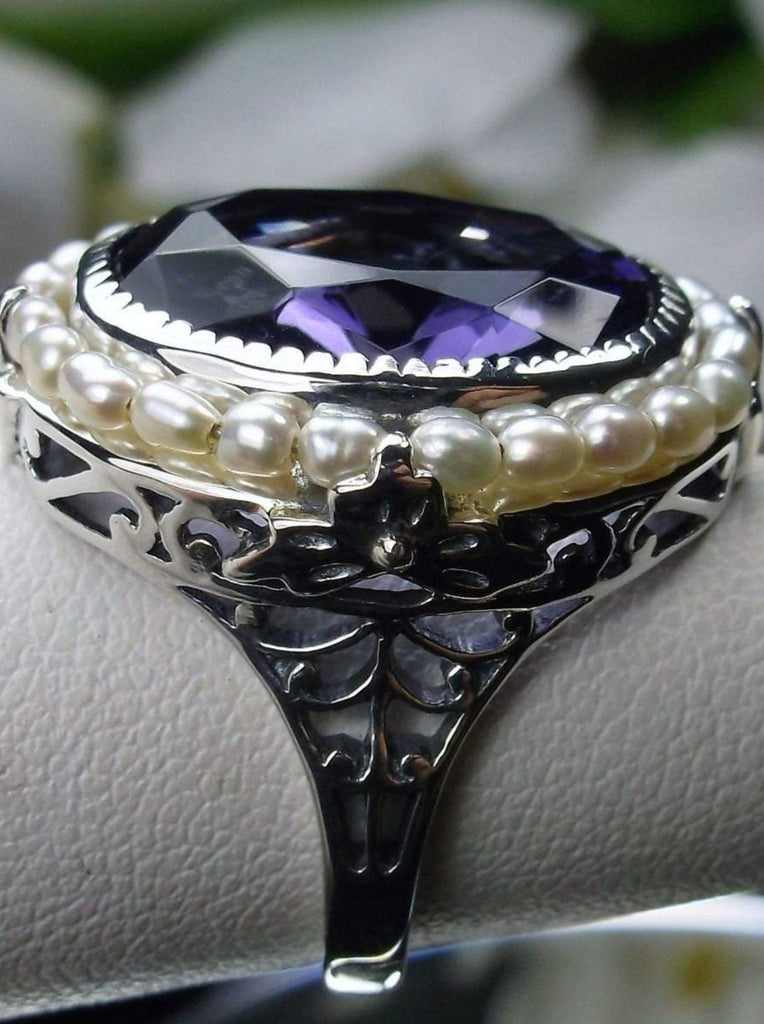 Amethyst Ring, Seed Pearls surround and accent the simulated oval stone with sterling silver Victorian filigree