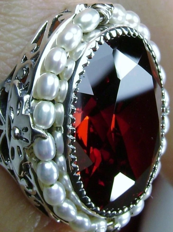 Garnet Ring, Seed Pearls surround and accent the simulated oval stone with sterling silver Victorian filigree