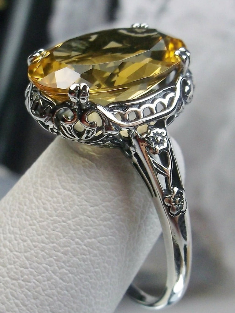 Natural Citrine Ring, Oval citrine gemstone, sterling silver floral filigree, Edward Design #D70, side view on ring holder