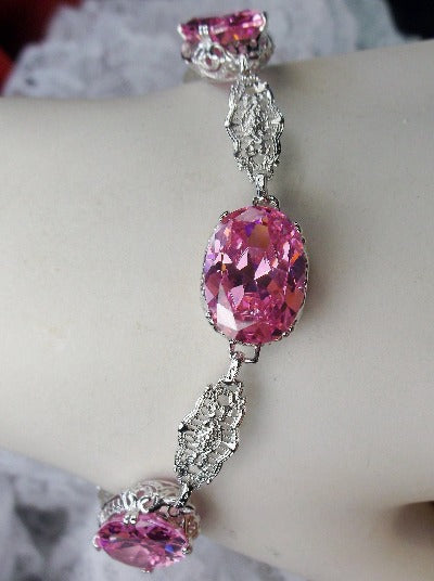 Rhodium plated sterling silver bracelet with pink CZ oval gemstones and Edwardian detailed filigree