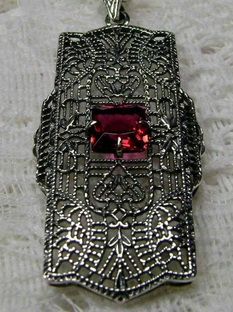 Red Ruby pendant, sterling Silver filigree field of intricate detail surrounds the center square stone accenting the beauty of the vintage look, Silver Embrace Jewelry