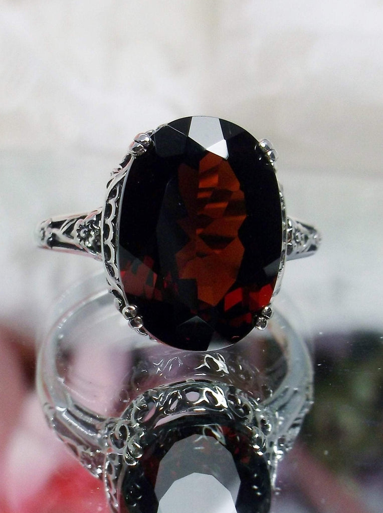 Natural Garnet Ring,  6.9 carat oval faceted natural gemstone, Sterling Silver floral filigree, Edward design #D70, on mirror surface