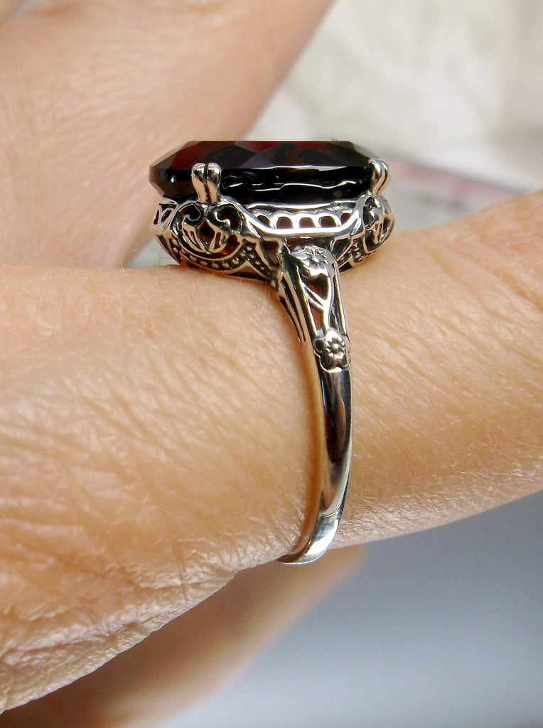 Natural Garnet Ring,  6.9 carat oval faceted natural gemstone, Sterling Silver floral filigree, Edward design #D70,  on a finger